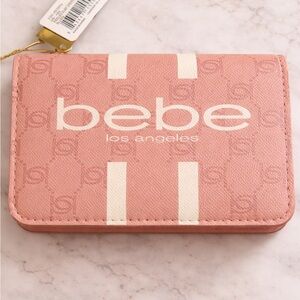bebe Pink crossbody with White Stripes and Logo